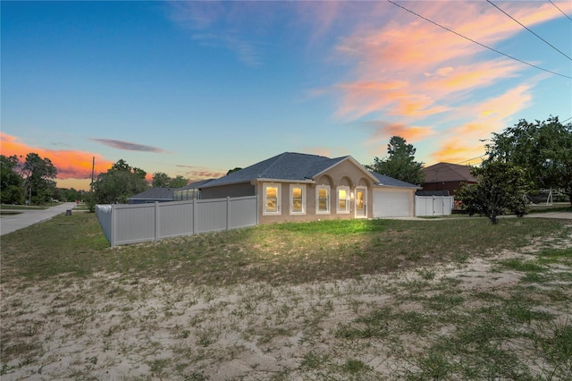5510 Moongate Rd, Spring Hill, FL 34606 - single story home with an attached garage and stucco siding