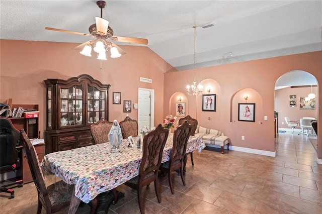 5510 Moongate Rd, Spring Hill, FL 34606 - dining space with arched walkways, a ceiling fan, a chandelier, vaulted ceiling, and baseboards