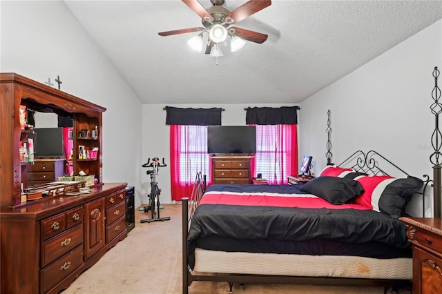 5510 Moongate Rd, Spring Hill, FL 34606 - bedroom with lofted ceiling, light colored carpet, a ceiling fan, and a textured ceiling