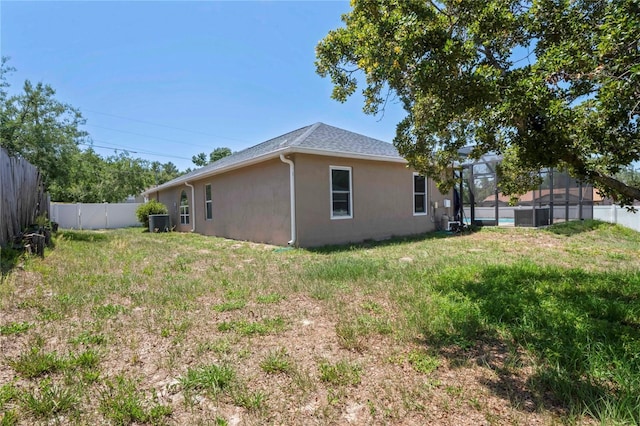 5510 Moongate Rd, Spring Hill, FL 34606 - view of yard with glass enclosure