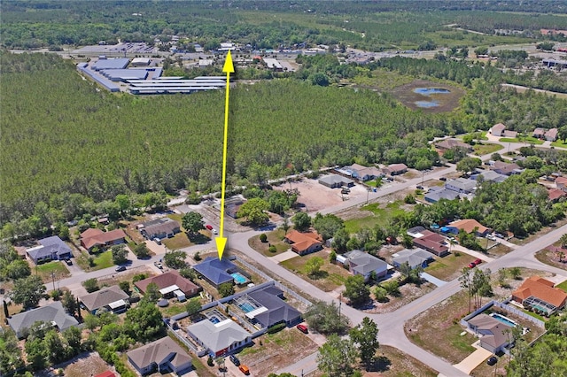 5510 Moongate Rd, Spring Hill, FL 34606 - view of property location featuring a heavily wooded area and nearby suburban area