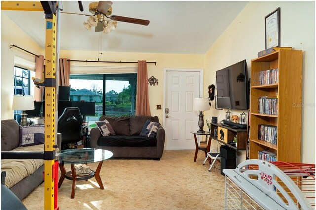 3261 Rogue St, North Port, FL 34291 - living area with carpet flooring, ceiling fan, and lofted ceiling
