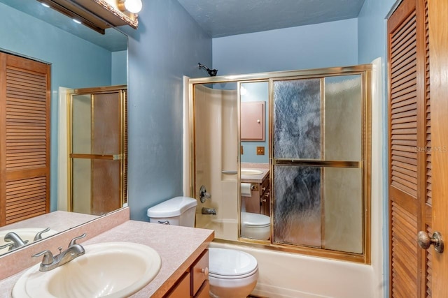 3261 Rogue St, North Port, FL 34291 - bathroom featuring a closet, toilet, and combined bath / shower with glass door