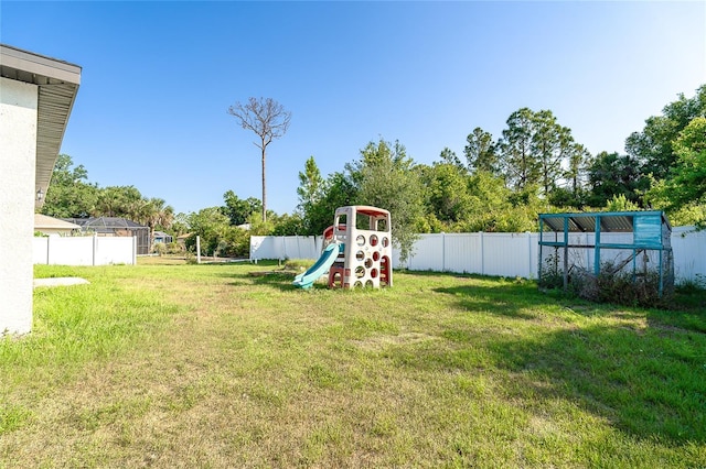 2408 Bonanza Ln, North Port, FL 34286 - view of yard featuring a playground