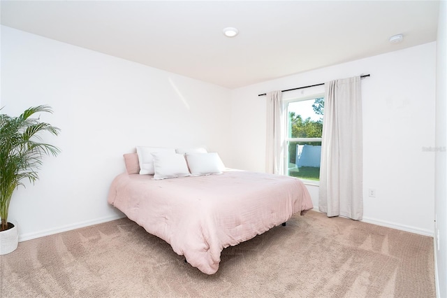 2408 Bonanza Ln, North Port, FL 34286 - bedroom with light carpet and baseboards