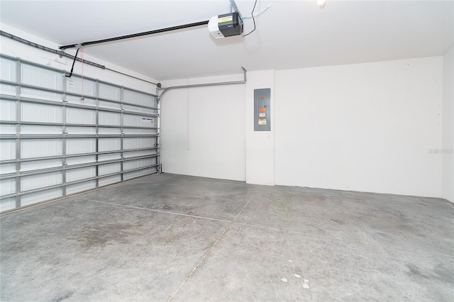 2408 Bonanza Ln, North Port, FL 34286 - garage featuring a garage door opener and electric panel