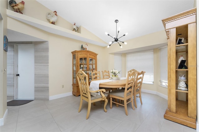 209 Fairway Rd, Rotonda West, FL 33947 - dining area featuring vaulted ceiling, a chandelier, baseboards, and light tile patterned floors
