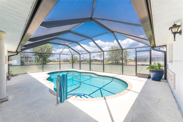 209 Fairway Rd, Rotonda West, FL 33947 - swimming pool featuring a patio and glass enclosure