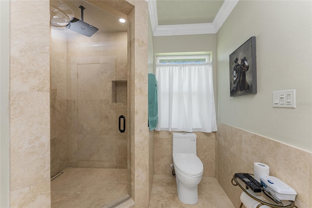 209 Fairway Rd, Rotonda West, FL 33947 - bathroom with ornamental molding, a shower stall, toilet, and tile walls
