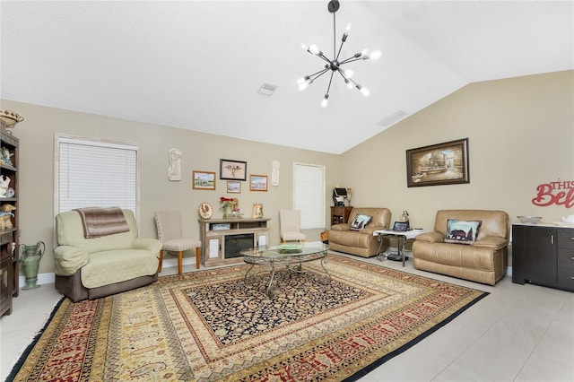 209 Fairway Rd, Rotonda West, FL 33947 - living room featuring lofted ceiling, a chandelier, and a fireplace