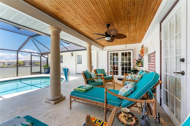 209 Fairway Rd, Rotonda West, FL 33947 - view of patio with french doors, an outdoor hangout area, ceiling fan, an outdoor pool, and a lanai