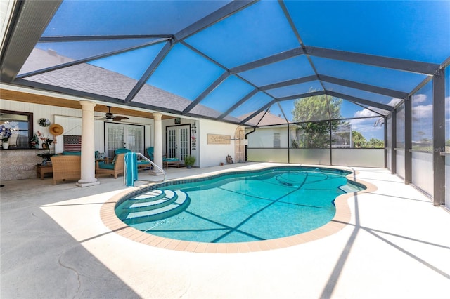 209 Fairway Rd, Rotonda West, FL 33947 - swimming pool featuring french doors, a patio area, ceiling fan, and a lanai