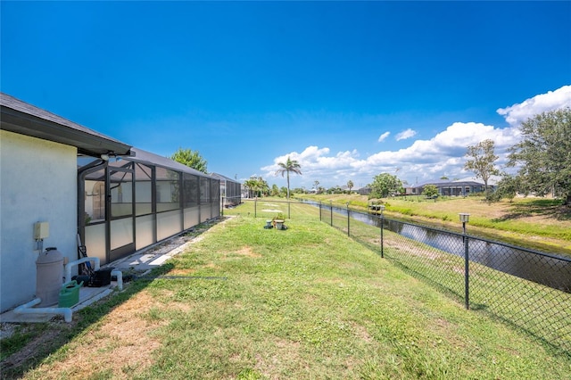 209 Fairway Rd, Rotonda West, FL 33947 - view of yard with a water view and a lanai