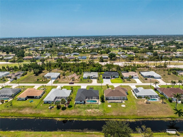 209 Fairway Rd, Rotonda West, FL 33947 - aerial view of residential area featuring a large body of water