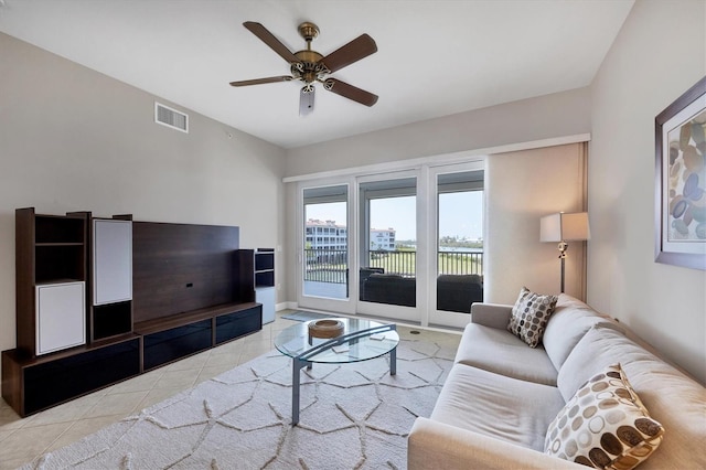 11100 Hacienda Del Mar Blvd Unit G-304, Placida, FL 33946 - living room featuring tile patterned floors, a ceiling fan, and baseboards