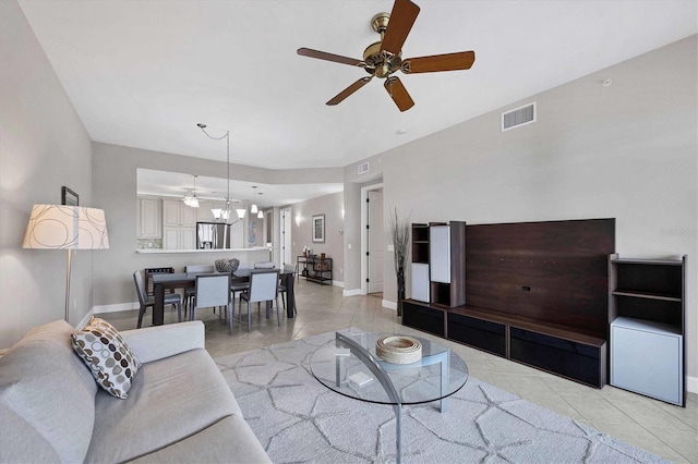 11100 Hacienda Del Mar Blvd Unit G-304, Placida, FL 33946 - tiled living area with a ceiling fan and baseboards