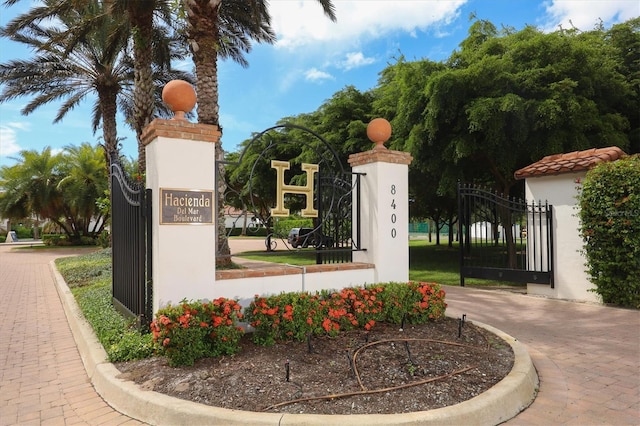11100 Hacienda Del Mar Blvd Unit G-304, Placida, FL 33946 - community / neighborhood sign featuring a gate