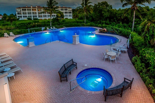 11100 Hacienda Del Mar Blvd Unit G-304, Placida, FL 33946 - community pool featuring a community hot tub and a patio area