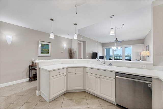 11100 Hacienda Del Mar Blvd Unit G-304, Placida, FL 33946 - kitchen with dishwasher, a sink, light tile patterned floors, light countertops, and decorative light fixtures