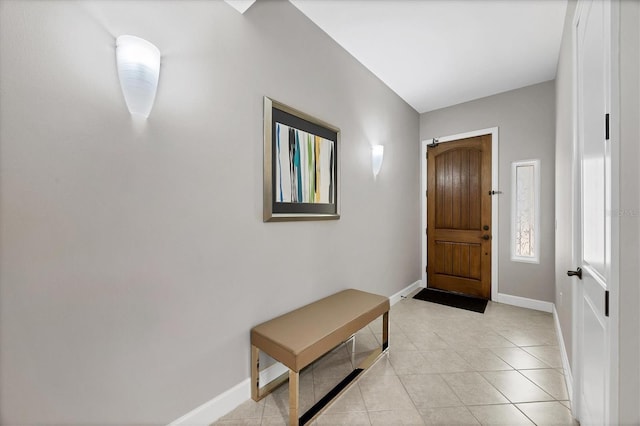 11100 Hacienda Del Mar Blvd Unit G-304, Placida, FL 33946 - foyer featuring baseboards and light tile patterned floors