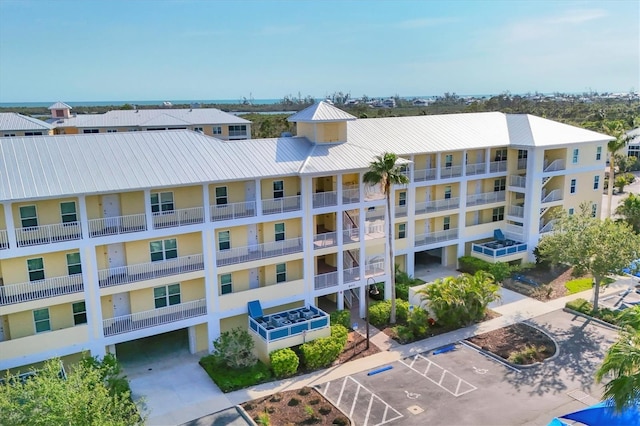 8411 Placida Rd Unit 404, Placida, FL 33946 - view of apartment building / complex featuring uncovered parking