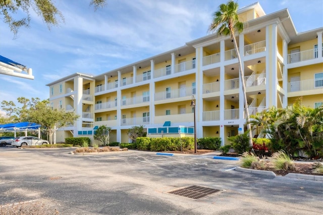 8411 Placida Rd Unit 404, Placida, FL 33946 - view of apartment building / complex with uncovered parking