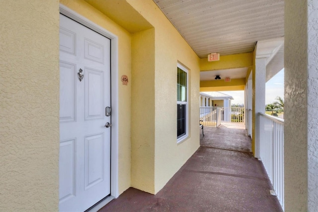 8411 Placida Rd Unit 404, Placida, FL 33946 - view of exterior entry featuring stucco siding