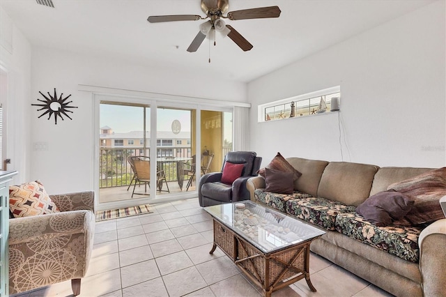 8411 Placida Rd Unit 404, Placida, FL 33946 - living area featuring light tile patterned flooring and ceiling fan