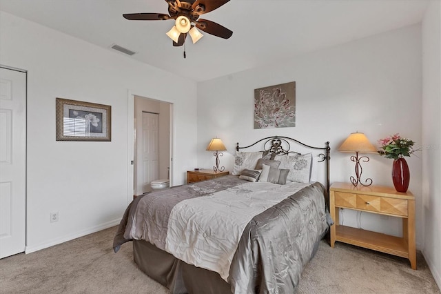 8411 Placida Rd Unit 404, Placida, FL 33946 - bedroom featuring carpet floors, baseboards, connected bathroom, and ceiling fan