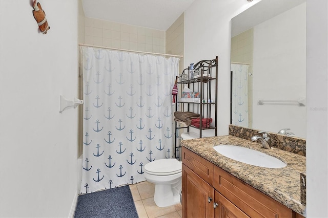 8411 Placida Rd Unit 404, Placida, FL 33946 - bathroom with tile patterned flooring, vanity, and toilet