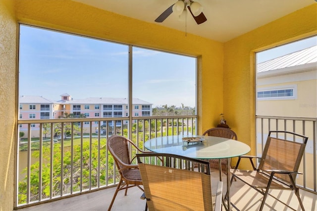 8411 Placida Rd Unit 404, Placida, FL 33946 - sunroom / solarium featuring healthy amount of natural light and a residential view