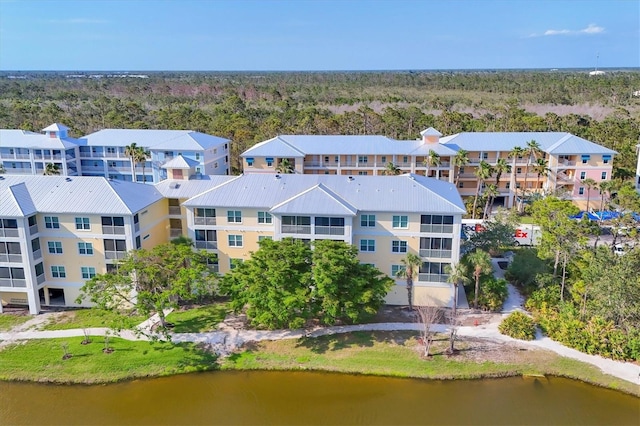 8411 Placida Rd Unit 404, Placida, FL 33946 - drone / aerial view of a heavily wooded area and a nearby body of water