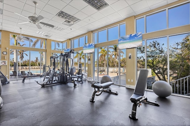 8411 Placida Rd Unit 404, Placida, FL 33946 - exercise room featuring a ceiling fan, a high ceiling, and a drop ceiling