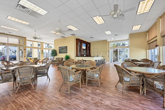 8411 Placida Rd Unit 404, Placida, FL 33946 - dining area with a ceiling fan and wood finished floors