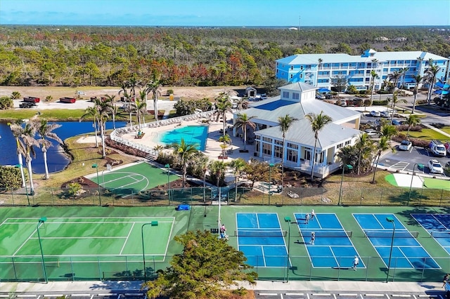 8411 Placida Rd Unit 404, Placida, FL 33946 - aerial view of a forest, a pool, and a nearby body of water