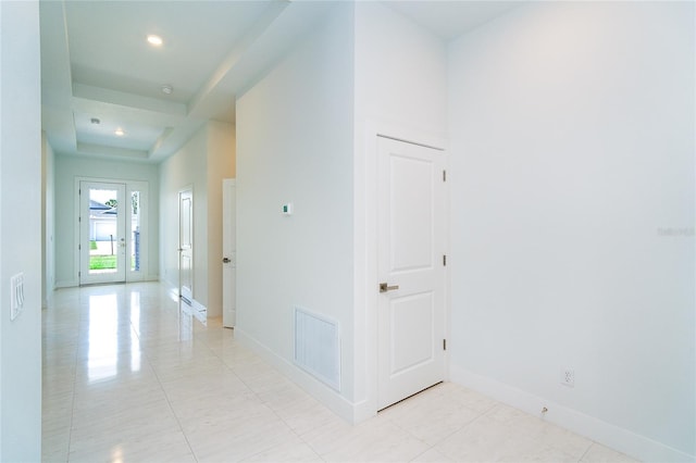 398 Sunset Rd N, Rotonda West, FL 33947 - hallway with baseboards, recessed lighting, and light tile patterned flooring