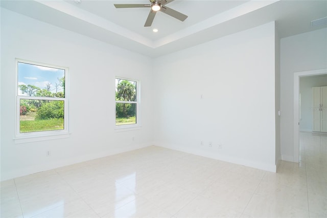 398 Sunset Rd N, Rotonda West, FL 33947 - empty room featuring ceiling fan and baseboards