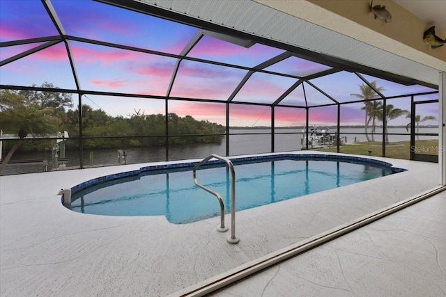 2295 Chilcote Ter, Port Charlotte, FL 33981 - outdoor pool with a water view, a patio area, and glass enclosure