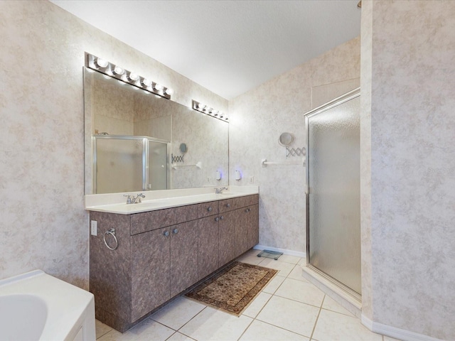 2295 Chilcote Ter, Port Charlotte, FL 33981 - full bath featuring a stall shower, tile patterned floors, double vanity, and a bath