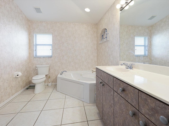 2295 Chilcote Ter, Port Charlotte, FL 33981 - full bathroom featuring a bath, vanity, toilet, tile patterned flooring, and baseboards