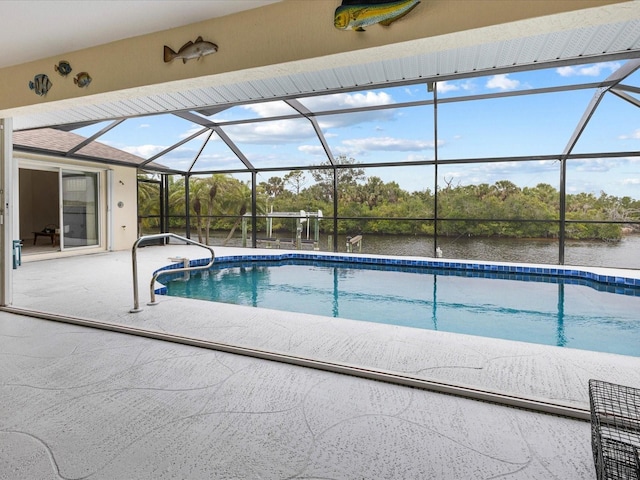 2295 Chilcote Ter, Port Charlotte, FL 33981 - swimming pool featuring a patio, a lanai, and a water view