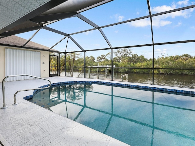 2295 Chilcote Ter, Port Charlotte, FL 33981 - outdoor pool with a water view, glass enclosure, and a patio area