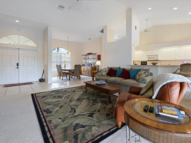 2295 Chilcote Ter, Port Charlotte, FL 33981 - living area with a ceiling fan, light tile patterned floors, high vaulted ceiling, and recessed lighting