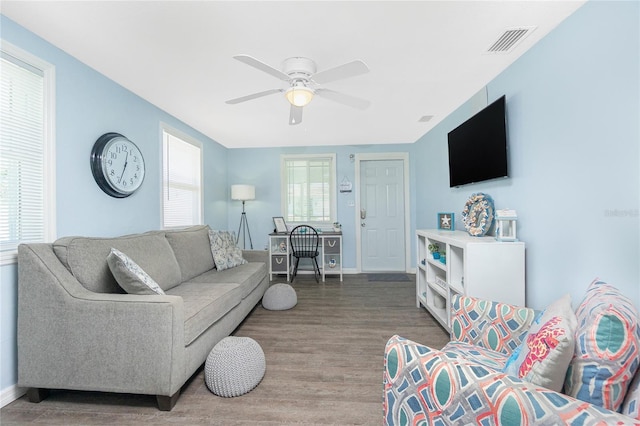 859 E 2nd St, Englewood, FL 34223 - living area featuring a ceiling fan, wood finished floors, and baseboards