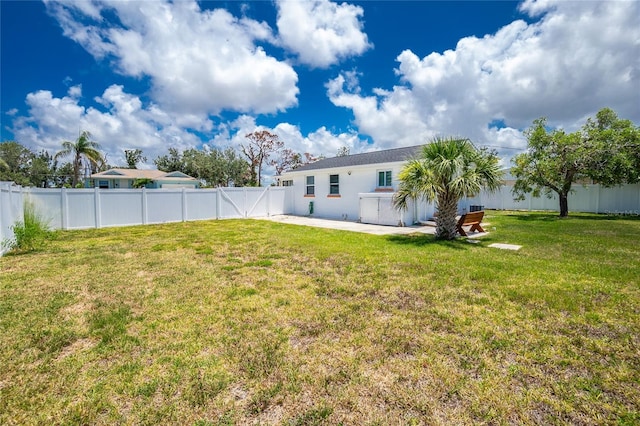 859 E 2nd St, Englewood, FL 34223 - view of yard featuring a patio