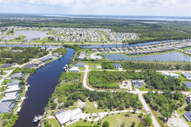 8127 Consul St, Port Charlotte, FL 33981 - aerial view of property's location with a large body of water and nearby suburban area