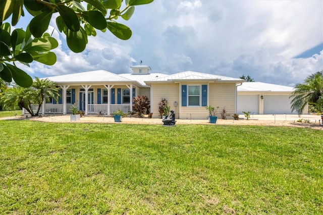 8127 Consul St, Port Charlotte, FL 33981 - ranch-style house featuring a porch, a front lawn, a metal roof, a standing seam roof, and driveway