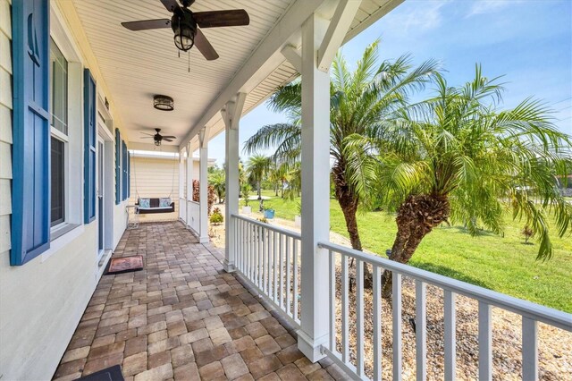 8127 Consul St, Port Charlotte, FL 33981 - covered porch featuring ceiling fan