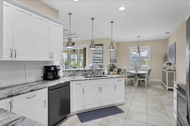 8127 Consul St, Port Charlotte, FL 33981 - kitchen featuring dishwasher, white cabinetry, stainless steel range with electric stovetop, a peninsula, and recessed lighting