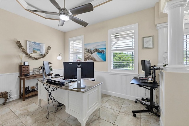 8127 Consul St, Port Charlotte, FL 33981 - office area featuring decorative columns, wainscoting, a ceiling fan, and healthy amount of natural light